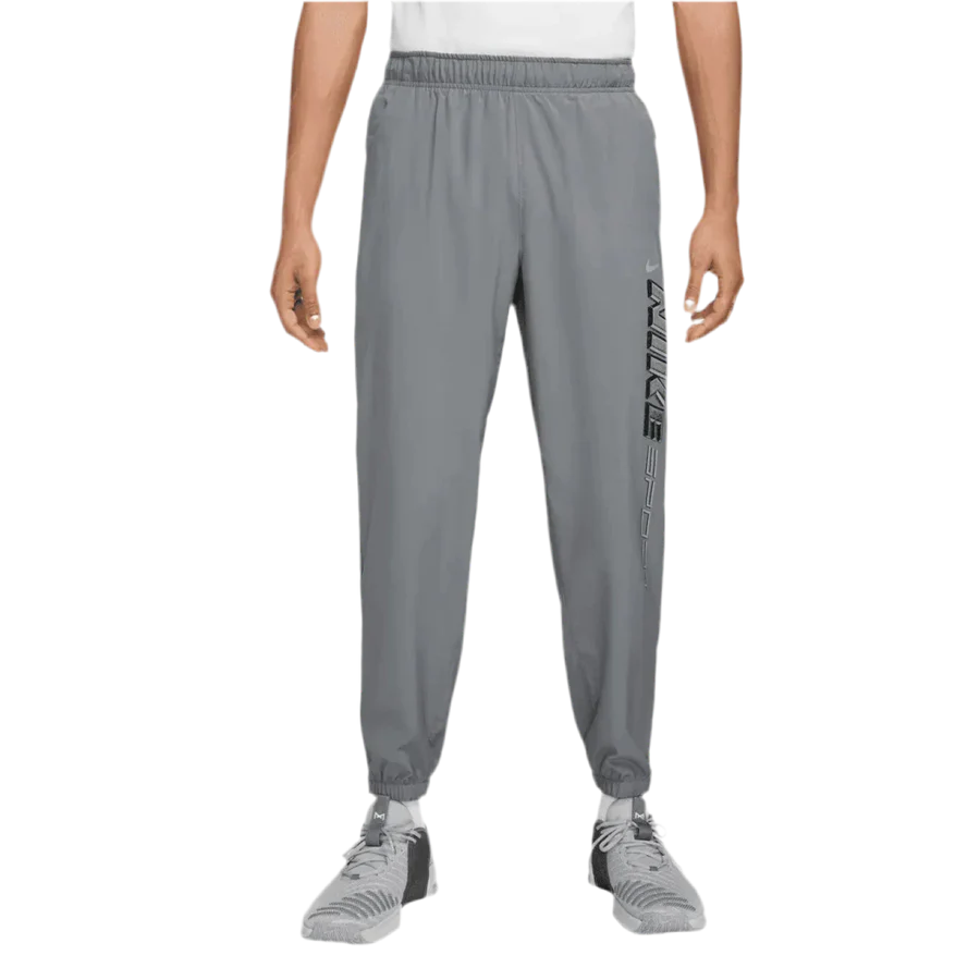 NIKE - FORM GFX GREY TROUSERS