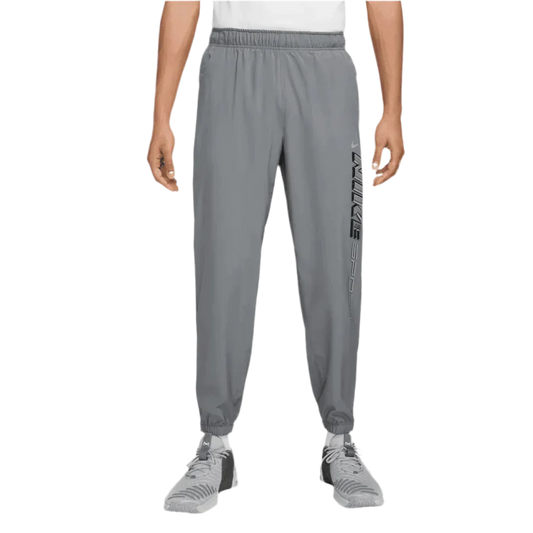 NIKE - FORM GFX GREY TROUSERS